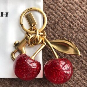 Coach Gold-Tone Key Charm with Red Glitter Cherries